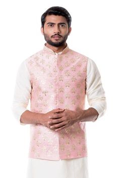 Pink bundi with floral embroidered motifs. Paired with kurta and churidar.
Components: 3
Fabric: Cotton Silk, Raw Silk
Neckline: Band
Sleeve Length: Three quarter
Color: Pink, Beige
Embroidered
Floral motif work - Aza Fashions Pink Kurta, Saree Gown, Waist Coat, Nehru Jackets, Contemporary Wedding, Churidar, Kurta Set, Online Fashion Stores, Embroidered Silk