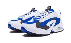 The Nike Air Triax ‘96 “OG Royal” is an original colorway of the ‘90s performance runner that was re-released by Nike in December 2019.  Famously worn by renowned sprinter Michael Johnson during the 1996 Summer Olympics in Atlanta, the Air Triax ‘96 has transcended its original purpose as a high performance running shoe to become favored as casual and timeless lifestyle options for all walks of life.  Nike places crisp white leather overlays on the heel, eyelets, and toe to compliment the royal Nike Air Max Triax, Royal Shoes, Michael Johnson, Stadium Goods, Summer Olympics, The 90s, Running Shoe, Air Max Sneakers, White Leather