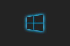 the windows logo in blue light on a black background with an image of a glowing window