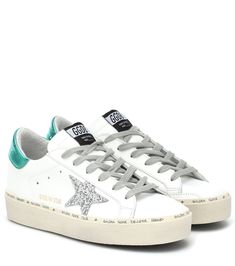 Here's to the Hi Star sneakers from Golden Goose, the MVPs (most versatile pair) from your new-season edit. The white leather upper is detailed with foam-green metallic heel tabs and glitter-trimmed appliqués. Whether worn for Saturday brunch or to ground smart-casual tailoring, there's a place for them in all looks. Silk Wedding Dress Simple, Golden Goose Hi Star, Saturday Brunch, Preppy Shoes, Golden Goose Sneakers, Metallic Heels, Shoe Inspo, Golden Goose Deluxe Brand, Star Sneakers