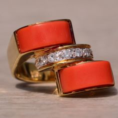 The Homeward Lane: Mid Century Coral And Diamond Ring. Theis Unique Ring Features A Rectangular Modified Cabochon Coral On The North And South Side Of The Ring. At The Ring's Center Matching The Rectangular Cabochon Shape Is A Row Of Bead Set Round Brilliant Cut Natural Diamonds. The Ring Is Crafted In 14 Karat Yellow Gold And Is Currently A Finger Size 6 Yet Can Be Adjusted To Any Finger Size For An Additional Charge On Request. Retro Ring, North And South, Bead Set, Unique Ring, Modern Retro, Womens Jewelry Rings, Unique Rings, Round Brilliant, Red Yellow