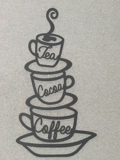 a stack of coffee cups with the words tea, cocoa and coffee written on them