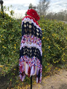 "70's Ponchos/Hippie Ponchos/Boho Ponchos/Lightweight Ponchos/Multi Ponchos/70's Vintage Ponchos/Vintage Ponchos/NEAR MINT CONDITION 1970's Red/White/Blue Handmade Poncho Hippie Boho Poncho Handmade Crocheted Lightweight Poncho This is a Great Long Length of 34\" from just Below the Neck. Measurements - Bust (entire width) - 52\" Length - 34\" from just below the Neck to the Longest Point in the Center NEAR MINT CONDITION - The Colors in this Poncho are Beautiful! It is listed as near mint condi Hippie Shawl Poncho For Festivals, One Size Bohemian Shawl Cape, Bohemian One Size Shawl Cape, Hippie Fringe Shawl Poncho, Bohemian Poncho Cape One Size, Bohemian Poncho Cape, Spring Poncho With Scarf, Spring Poncho With Scarf In One Size, One Size Festival Shawl Cape