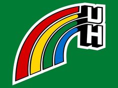 a rainbow sticker with the word uh above it in black and green, on a dark background