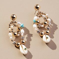 Dannijo Grace Earrings Brand New With Tags. Please Allow 1 Week To Ship Florida-Born Sisters Danielle Snyder And Jodie Snyder Morel Create Luxury Pieces With Artisanal Attention To Detail. Designed In Their New York City Studio, Each Limited-Edition Collection Is A Statement Of Timeless Elegance. 10k Gold-Plated Brass; Shell, Pearls, Turquoise 2” L Dannijo Jewelry, Luxury Pieces, Brass Shell, Studio City, 10k Gold, Timeless Elegance, York City, New York City, Shells