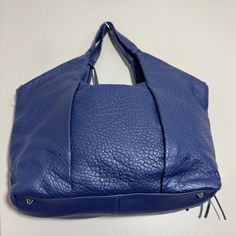 Nwot Vince Camuto Convertible Lamb Leather Pleated Tote Steph Deep Indigo Blue Pleated Body, Zip Pockets, Knotted Zipper Pull, Logo Fob, Zipper Closure, Detachable Shoulder Strap, Back Pocket With Magnetic Snap Lined Interior, Slip Pocket, Zipper Pocket, Two Media Pockets, Card Slot, Leash With Dog Clip Measures 19-1/4"W X 18-1/2"H X 5-3/8"D With A 9-3/4" Handle Drop; Weighs 2 Lbs., 3 Oz Body/Trim 100% Lamb Leather; First Lining 100% Polyester; Second Lining 100% Polyurethane In Perfect Conditio Large Hobo Bag, Hobo Tote Bag, Leather Hobo Handbags, Gray Handbags, Body Trim, Hobo Crossbody Bag, Teal Leather, Deep Indigo, Dog Clip