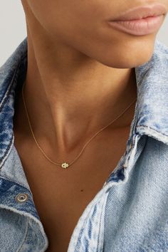 Jennifer Meyer's necklace is strung with a tiny Hamsa hand charm that symbolizes protection, happiness and good fortune. This dainty style is handmade from 18-karat gold and set with a single glistening emerald. Our edit also includes a diamond version, too. Dainty Delicate Chain Necklace For Good Luck, Dainty Gold Plated Charm Necklace For Good Luck, Dainty Delicate Chain Jewelry For Good Luck, Good Luck Yellow Gold Necklaces With Delicate Chain, Good Luck Yellow Gold Necklace With Delicate Chain, Minimalist Good Luck Pendant Necklaces, 14k Yellow Gold Necklace For Good Luck, Dainty Yellow Gold Charm Necklace For Good Luck, 14k Yellow Gold Good Luck Necklace