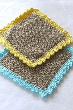 two crocheted coasters sitting on top of each other