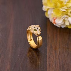 Tiger Head Ring With Cubic Zircon Stone, Handmade Adjustable Ring, Wild Tiger Ring, Animal Unisex Ring, Memorial Gift for Men D E S C R I P T I O N  : Metal : Brass Plating : Gold Plated Gemstone : Cubic Zircon Weight : 7.60 Gram Approx Stone Size : 1.5 MM Approx ❣❣ Handmade Item ❣❣   **Made to Order** » G EM S T O N E D E T A I L « **Gemstone structure may vary from the image as two gemstones do not have the same structure** If you want to see the picture of gemstone, then feel free to contact us. » C U S T O M I Z E O R D E R « All gemstone jewelry is made with silver and brass. If you want to make any changes with this jewelry, then please send us a message. We will make as per your requirements. For more beautiful designs please visit our Etsy shop below: https://www.etsy.com/shop/Miss Beautiful Wedding Rings Diamonds, Tiger Ring, Wild Tiger, Head Ring, Beautiful Wedding Rings, Tiger Head, Unisex Ring, P T, Memorial Gifts