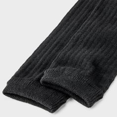 Keep cozy and stylish with the Women's Ribbed Supersoft Leg Warmer Boot Socks - Universal Thread™ 4-10. These socks offer a snug fit with a ribbed design that adds texture and warmth. The supersoft material feels great against your skin, making them ideal for chilly days. Wear them with boots or around the house for extra comfort and a touch of effortless style. Universal Thread™: Found exclusively at Target. Snug Fit Socks For Fall Loungewear, Casual Super Soft Knee-high Socks For Winter, Comfortable Leg Warmers For Cold Weather, Super Soft Black Socks For Winter, Casual Winter Socks For Loungewear, Comfortable Footless Socks For Winter, Casual Winter Loungewear Socks, Snug Black Socks For Winter, Soft Snug Knee-high Winter Socks