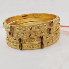 Beautiful gold bangle wedding party wear Metal - 22k yellow Gold Weight - 37.11 approx (4 pcs) Width - 0.7 cm Size - all available (message us ) Indian Bangle Bracelets, 14k Gold Bangle Bracelet, Unique Bangle, Paired Jewelry, Bangles Indian, Open Bangle, Women Bracelet, Jewelry Indian, Gold Cuffs