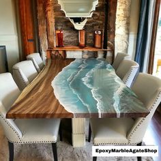 a dining room table with an ocean design on it