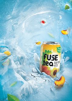 a can of fruit tea is floating in the water and surrounded by other fruits that are flying around