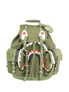 olive green cotton canvas appliqué detailing single top handle two adjustable shoulder straps foldover top front buckle fastening two front cargo pockets silver-tone hardware Military Green Bags With Pockets, Military Style Green Bags With Pockets, Green Bag With Adjustable Strap For Streetwear, Green Backpack With Multiple Pockets, Green Military Style Backpack, Military Style Green Backpack, Green Military Canvas Bag, Digital Camera Photography, Balenciaga Track