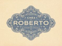 the label for roberto's italian restaurant is blue on cream paper with an ornate border