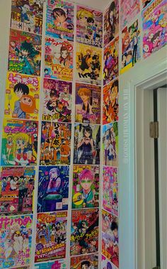 a wall covered in anime comics and cartoon character images, with the door open to another room