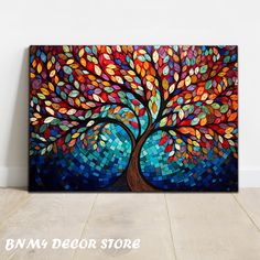 a painting on the wall with a colorful tree