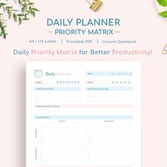 the daily planner printable is displayed on top of a pink background with green leaves