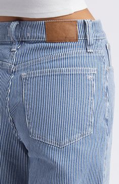 These railroad-striped cropped jeans have slouchy wide legs and a high-fitted waist with the holds-you-in sorcery of Magic Pockets in front. 26 1/2" inseam; 19" leg opening; 11 1/2" front rise; 15 1/2" back rise (size 29) Zip fly with button-tab closure Five-pocket style 99% cotton, 1% elastane Machine wash, tumble dry Imported Womens Jeans 2024, Striped Jeans Outfit, Thrifting Ideas, Sailor Jeans, Sailor Jean, Jeans Outfit Winter, Womens Pants, Striped Jeans, Womens Jeans