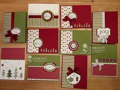 many cards are arranged on a table with red, green and white paper in the middle