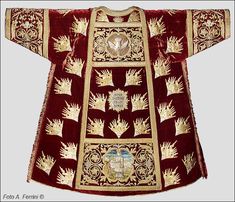 an elaborately decorated red and gold robe