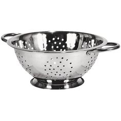 a metal colander with handles and holes on the bottom, sitting on a white background