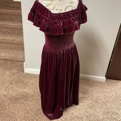 Nwt. Size Small. Very Forgiving With Smocking At The Chest/Waist Area. Can Be Worn On Or Off The Shoulder. Gorgeous Velvet, Soft Stretchy Fabric. 80% Viscose 20% Silk. This Is The Burgundy Color But Tones Of Purple And Pink Throughout. Tea Length. Tea Length, House Dress, House On A Hill, Burgundy Color, Smocking, Off The Shoulder, Velvet, Silk, Womens Dresses