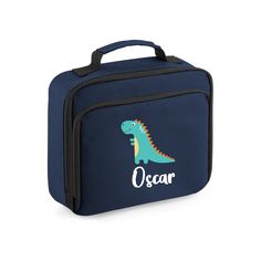 A lovely Personalised Dinosaur Lunch Bag the perfect size for you child at school to fit all his much needed fuel for school. This Dinosaur School Lunch Bag is blue and features your child's name so that it's sure not to get lost and a dinosaur a much loved animal. This Kids Animal Cooler Bag is white inside and is waterproof. Use this Boys School Lunch Bag for any age of child for school trips, nursery school, picnics and more. Suitable for Children Student a Back To School item. Dimensions- 24 School Bags With Animal Design For Back To School, Novelty School Bag, Novelty Portable School Bags, School Satchel Bag With Animal Design, School Satchel With Animal Design, Customizable Rectangular School Shoulder Bag, Customizable Rectangular Shoulder Bag For School, Novelty School Bags, Customizable Blue School Bag