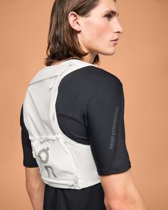 A lightweight, customizable, 10-liter trail running vest for long distances. Includes two 500 ml Hydrapak® flasks plus space for a hydration bladder. With a 10-liter capacity, this high-performance vest was built for distances at the longer end of the ultra spectrum. Tested and trialed by our elite team of trail athletes, its functional, modular design ensures a seamless experience on any trail, whether racing, training or chasing the high. Ultralight yet tough, the breathable mesh material is t Running Pack, Running Trail, Weighted Vest, Sea To Summit, Running Vest, Photo P, White Accessories, Daisy Chain, Road Running