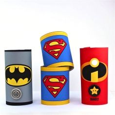 three different types of toilet paper with batman and superman logos on them