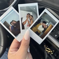 three polaroid photos are being held in the car