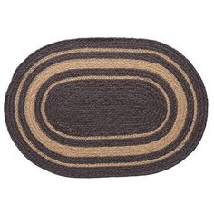 a brown and black oval rug on a white background with an oval border in the center