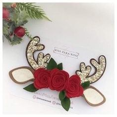 a red rose and deer headband with sequins