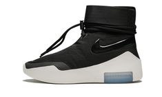 The Nike Air Fear of God Shoot Around is one of two models released within the debut FOG x Nike collection in 2018.  While there are similarities between this silhouette and the high-profile Fear of God 1, the Fear of God Shoot Around is designed with a more minimalist upper devoid of the TPU “cage” in favor of a sleek all-black material with a lacing system and strap that both wrap the ankle.  The upper sits atop a sculpted foam sole with a visible Zoom Air unit in the heel.  The result is an i Nike Air Fear Of God, Nike Collection, Balenciaga Speed Trainer, Stadium Goods, New Nike Air, Fear Of God, Nike Basketball, New Sneakers, Puma Fierce Sneaker