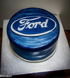 a blue cake with the word ford on it