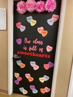 a door decorated with hearts and flowers for valentine's day or other special occasion