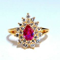 .60ct. Natural Ruby Cocktail Halo Ring Pear Cut Fully Faceted Clean Clarity 5.3 X 3.4mm Vivid Red / Vs Clear Clarity .42ct. Diamonds: Rounds, Full Cuts G-Color, Vs-2 Clarity. 14kt. Yellow Gold. 3.2 Grams. Deck Of Ring: 14mm X 11mm Depth: 6.3mm Current Ring Size: 5 We May Resize, Please Inquire. $5000 Appraisal Certificate Will Accompany. Vera Wang Ring, Enchanted Ring, Ruby Cocktail, Platinum Diamond Wedding Band, Beads Craft Jewelry, Classic Wedding Rings, Ruby Diamond Rings, Trendy Ring, Diamonds Ring