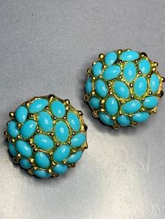 LOVELY DESIGNER KENNETH JAY LANE Vintage Dome Turquoise Blue, gold Plated Clip On Earrings, Boho Beach Summer Ibiza Party Glamour Statement earrings, These have lovely oval resin drops set in gold plated metal. Signed at the back Measurements: 2.3cm diameter Condition: In ABOVE excellent vintage condition, The clips are secure and tight. Please look at the photos as they are truly representative of the condition of these lovely earrings. All our items are priced including delivery tracked and si Blue Costume Jewelry Wedding Earrings, Blue Costume Jewelry Earrings For Wedding, Vintage Turquoise Earrings For Party, Beach Glamour, Ibiza Party, Runway Necklace, Bridal Art, Costume Jewelery, Jewelry Boards