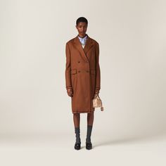 Straight fit Lined Classic lapel Front button closure Straight sleeves Low flap pockets Back vent Embroidered logo Designer Brown Formal Outerwear, Brown Designer Formal Outerwear, Designer Brown Outerwear For Formal Occasions, Miu Miu Winter Workwear Outerwear, Chic Miu Miu Outerwear For Work, Luxury Miu Miu Outerwear For Fall, Luxury Miu Miu Fall Outerwear, Designer Gabardine Outerwear For Formal Occasions, Fall Luxury Miu Miu Outerwear