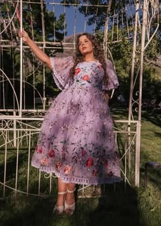 Lavender Haze And Summer DaysThis whimsical and enchanting piece captures the essence of springtime beauty. Its soft lavender hue is beautifully accented with vibrant floral embroidery, featuring bold red poppy blossoms, wildflowers, and delicate... Garden Tea Party Outfit, Bridgeton Theme, Whimsical Outfit, Spring Witch, Lavender Outfit, Spring Time Outfits, Hope Is The Thing With Feathers, Green Vines, Lavender Haze