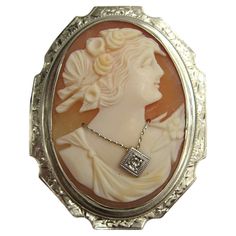 lovely 14k White Gold Carved Cameo Pin . Depicting a lovely lady with a wonderful diamond necklace. It measures 1.85 in. top to bottom x 1.55 in. wide. Pin back works great. What a wonderful addition to your jewelry collection. Please check our storefront for hundreds of items including New, Never worn vintage Jewelry, vintage and Contemporary Fashion. Any questions please call, email or hit contact. Be sure to check our storefront for more fabulous pieces from this collection. We have been sell Brooch Diamond, Cameo Jewelry, Circle Diamond, Diamond Brooch, Cameo Brooch, Pin Pendant, Cameo Pendant, Gold Brooches, Moda Vintage