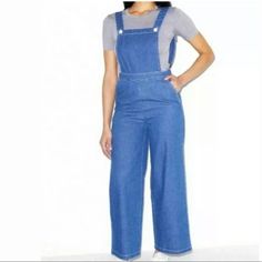 Brand New With Tags....Never Worn. Questions? Leave A Comment Below! High Rise Cotton Overalls In Medium Wash, High Rise Medium Wash Cotton Overalls, Casual Light Wash Overalls For Workwear, Casual Workwear Overalls In Medium Wash, Utility Blue Denim Jumpsuit, Blue Utility Denim Jumpsuit With Straight Leg, Blue Utility Overalls With Straight Leg, Utility Blue Denim Jumpsuit For Spring, Blue Denim Utility Jumpsuit