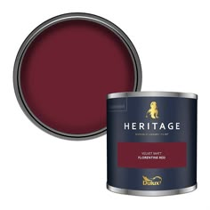 a red paint can with the lid open to show it's interior and exterior