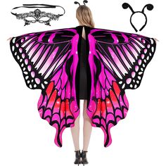 a woman wearing a pink butterfly wings cape and matching headbands is standing in front of a white background