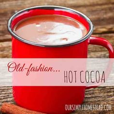 an old fashion hot cocoa in a red mug with cinnamon stick on the side and text overlay