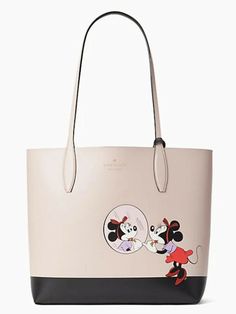 Designer Kate Spade DISNEY MINNIE MOUSE Large REVERSIBLE TOTE & WRISTLET! NEW!💗. LIMITED EDITION!! Such a timeless, collectible & gorgeous handbag!! It's reversible too and has the cutest print!! DETAILS: 12.4"h x 18.3"w x 6.3"d drop: 10" refined grain leather unlined open top tote bag logo foil embossed logo open top with removable wristlet imported style # wkr00215 Condition is "New with tags". Shipped with USPS Priority Mail + Insurance! Mickey Mouse Bag, Kate Spade Minnie Mouse, Kate Spade Disney, Disney Purse, Kate Spade Crossbody Purse, Disney Bags, Kate Spade Outlet, Disney Handbags, Disney Bag