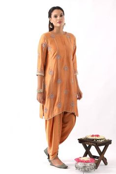 Buy Orange Chanderi Silk Embroidery Floral Round Neck Kurta Dhoti Pant Set For Women by Nemaani Online at Aza Fashions. Traditional Fitted Pant Set With Dupatta, Traditional Silk Pant Set For Wedding, Traditional Silk Wedding Pant Set, Semi-stitched Pant Set With Zari Work For Festivals, Bollywood Style Embroidered Chanderi Pant Set, Chanderi Pant Set With Dupatta For Festivals, Semi-stitched Traditional Pant Set For Festivals, Festival Chanderi Pant Set With Dupatta, Embroidered Cotton Silk Palazzo Set