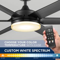 a person holding a remote control in front of a ceiling fan with the words choose your color temperature with ease