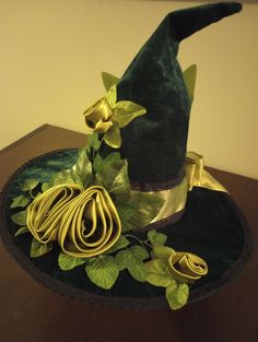 Hand Sewn Ladies Velvet Celtic Green Fairy Wizard Witch Hat with Silk Roses Fantasy Renfaire. The velvet green hat is satin lined to protect your hair and has cotton lace, green and gold ribbon, green leaves and flowers and a feather.  Perfect for renfaire, party, halloween, or other events. Fairy Wizard, Fairy Hat, Chicago Bulls Snapback Hat, Celtic Green, Blue Bucket Hat, Straw Hat Beach, Green Fairy, Green Hat, Beanie Style