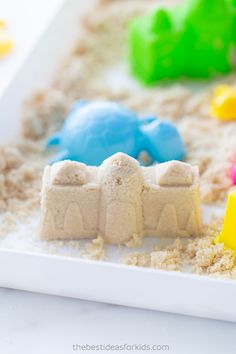 there are sand toys in the shape of elephants